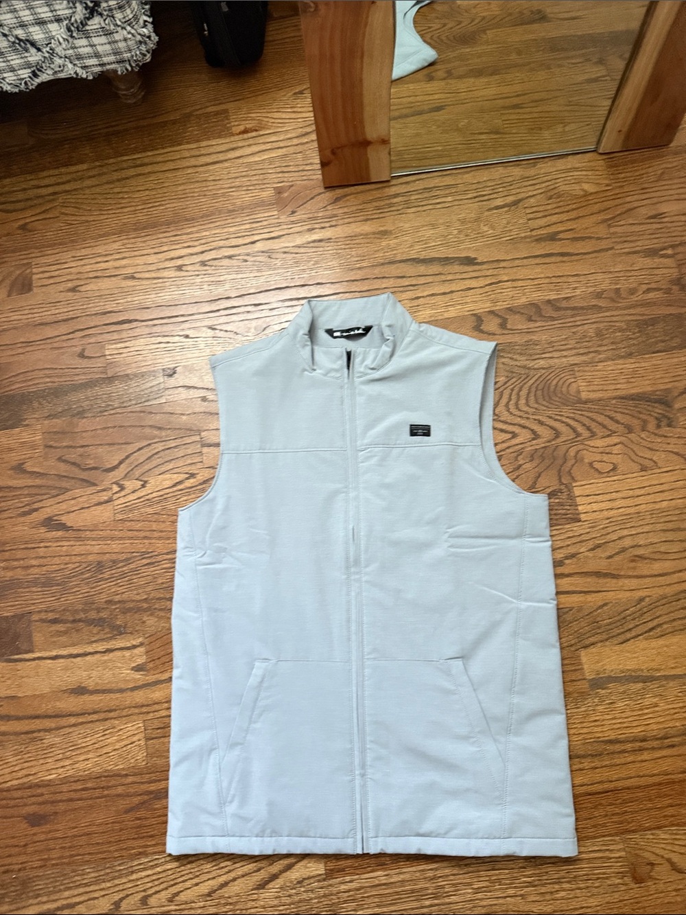 Travis Mathew Gray Vest with Black Logo Patch